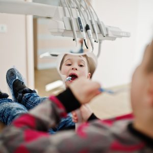 Little boy at dentist chair. Children dental.